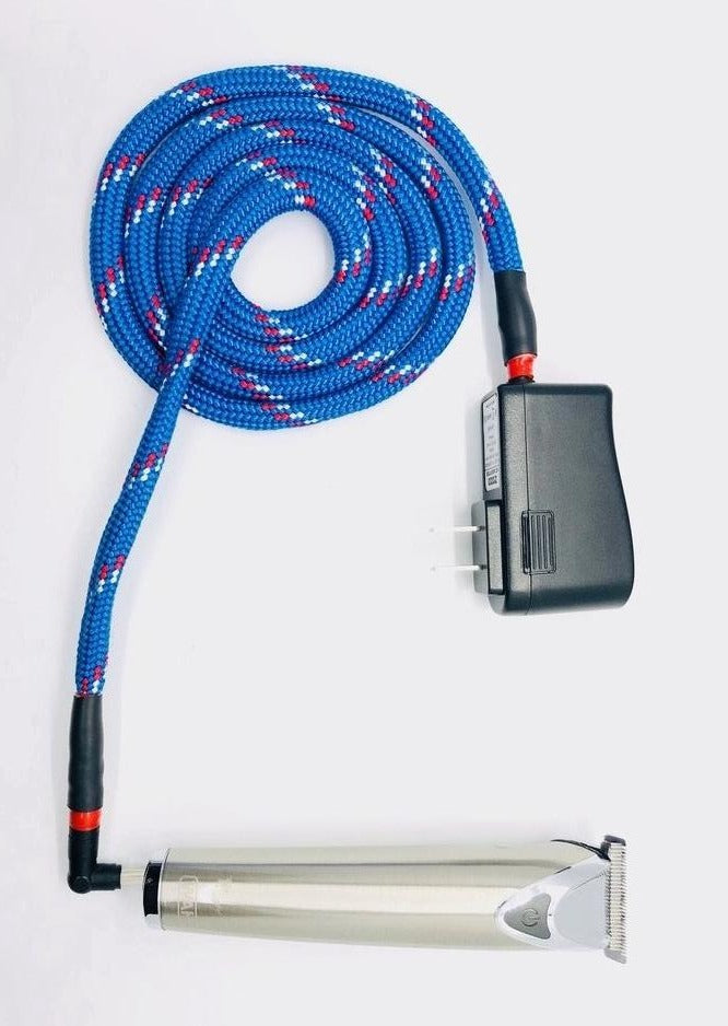 Black AC power adapter with a thick blue nylon braided rope plugged in to cordless clippers